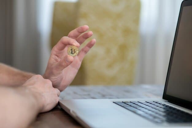 A close-up of a hardware wallet device connected to a laptop, showing a Bitcoin transaction being confirmed on the screen.
